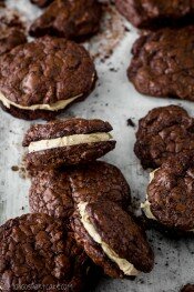 Chocolate brownie cookie sandwiches with peanut butter frosting filling